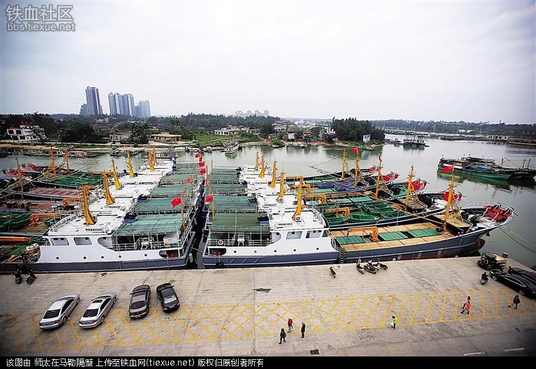 24 December 2015: Tanmen Maritime Militia?s newly-delivered 500-ton fishing vessels stand ready at Tanmen Harbor?s pier.