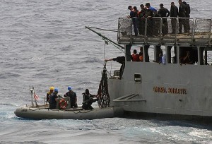 U.S. and Venezuelan Sailors work together during counter-drug operations in 2009. 