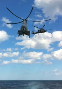 Manned (SH-60B) and unmanned (MQ-8B) helicopters working together on USS Halyburton (FFG 40)