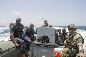(April 2, 2014) - U.S. Sailors, U.S. Coast Guardsmen and Ghanaian maritime specialists, all embarked aboard joint, high-speed vessel USNS Spearhead (JHSV 1), ride in a rigid-hull inflatable boat (U.S. Navy photo by Mass Communication Specialist 2nd Class Jeff Atherton/ Released)