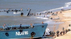 Chinese marine forces practice a beach assault during the Mission Action 2013 exercise.