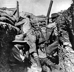 An Australian Sniper peers over a trench in 1915.