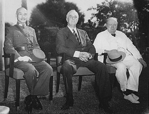FDR sits between Chiang Kei Shek and Winston Churchill at the Cairo Conference.