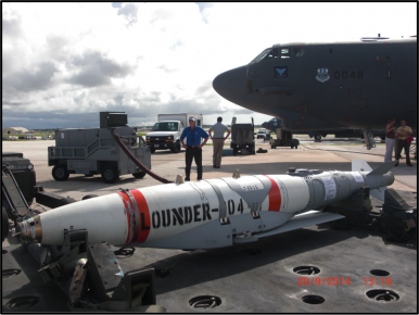 Figure 1: Flounder 004, an inert GBU-62Bv(1)/B Quick Strike ER awaits loading on a B-52H at Guam (Col Mike Pietrucha, USAF)