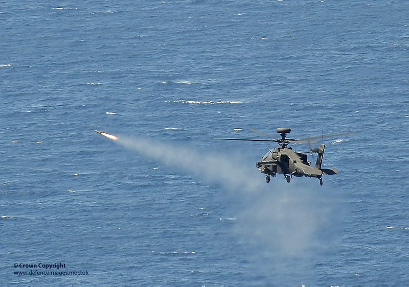 An Apache attack helicopter of 656 Squadron Army Air Corps is pictured firing a Hellfire missile during an exercise conducted from HMS Ocean. Photographer: LA(PHOT) Guy Pool Image 45152700.jpg from www.defenceimages.mod.uk