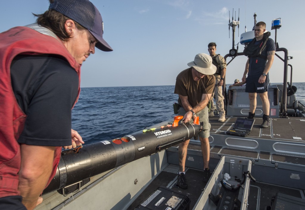 A Kongsberg REMUS 100 unmanned underwater vehicle being retrieved on one of USS Fort Worth LCS 3's boats in the South China Sea. Much like the Seafox, its speed (~4.5 knots) and endurance are limited and will struggle in areas of high current. U.S. Navy photo. 