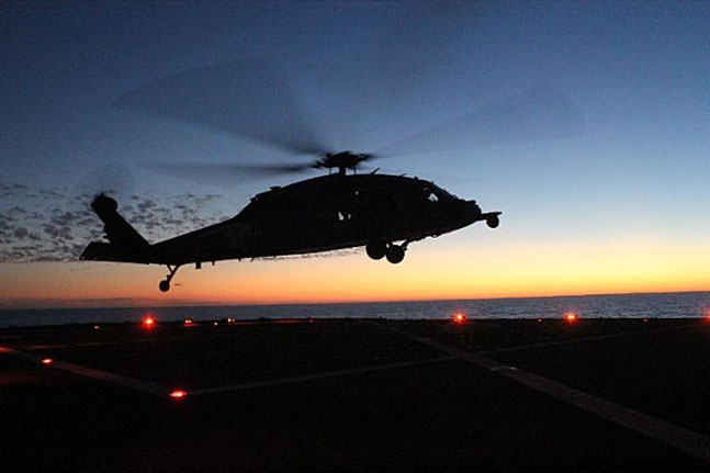 Passive and active search tactics with organic assets will need to be developed for each ship and helicopter pair (US Navy Photo).