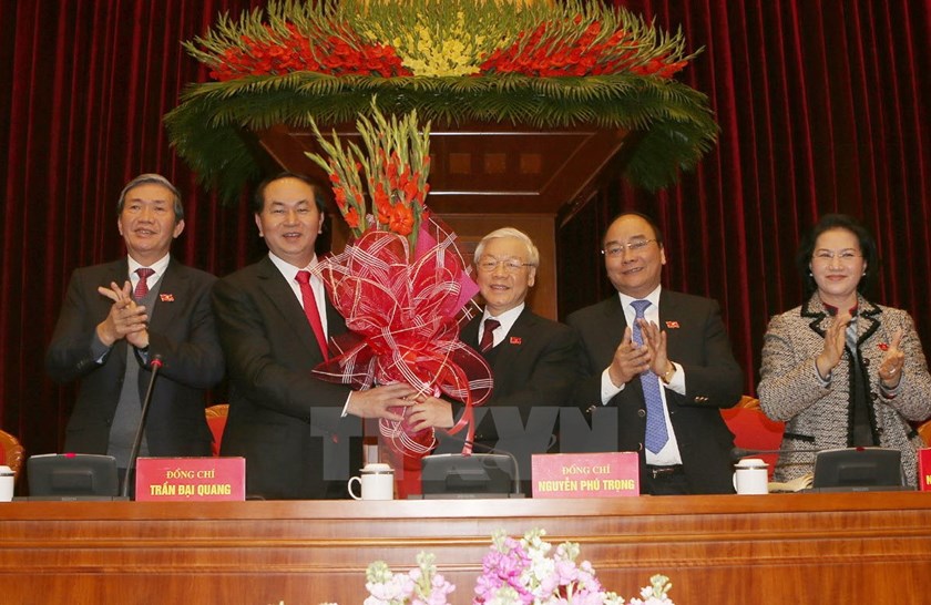 Politburo members. From left to right: Dinh The Quynh, Tran Dai Quang, Nguyen Phu Trong, Nguyen Xuan Phuc, and Nguyen Thi Kim Ngan.