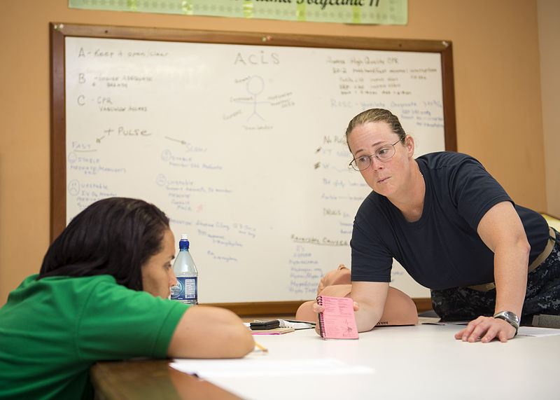  U.S. Navy Lt. Cmdr. Suzanne Maldarelli, right, a medical officer, conducts a subject matter expert exchange on advanced cardiac life support with Lissette Recinos, a public health nurse, at a hospital in Toledo, Belize, June 27, 2014, during Southern Partnership Station (SPS) 2014. SPS is an annual deployment of U.S. ships to the U.S. Southern Command's area of responsibility in the Caribbean and Latin America. The exercise involves information sharing with navies, coast guards and civilian services throughout the region. MC3 Andrew Schneider.