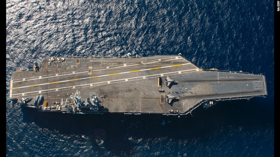 Two F-35s on the deck of the USS Nimitz during the first carrier trials for the aircraft in November 2014. US Navy photo.