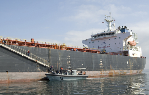 SAN PEDRO, Calif. Ð A Border Enforcement Security Task Force boarding team conducts a boarding on a tanker vessel April 29 off the coast of Long Beach, Calif. The Los Angeles BEST is the nationÕs first seaport task force of its kind, bringing together multiple agencies including the U.S. Coast Guard, U.S. Immigration and Customs Enforcement, California Border Patrol, Los Angeles County SheriffÕs Department, and Los Angeles and Long Beach Port Police. The BEST was created to enforce maritime laws and combat smuggling in the ports. (U.S. Coast Guard photo/Petty Officer 3rd Class Cory J. Mendenhall)