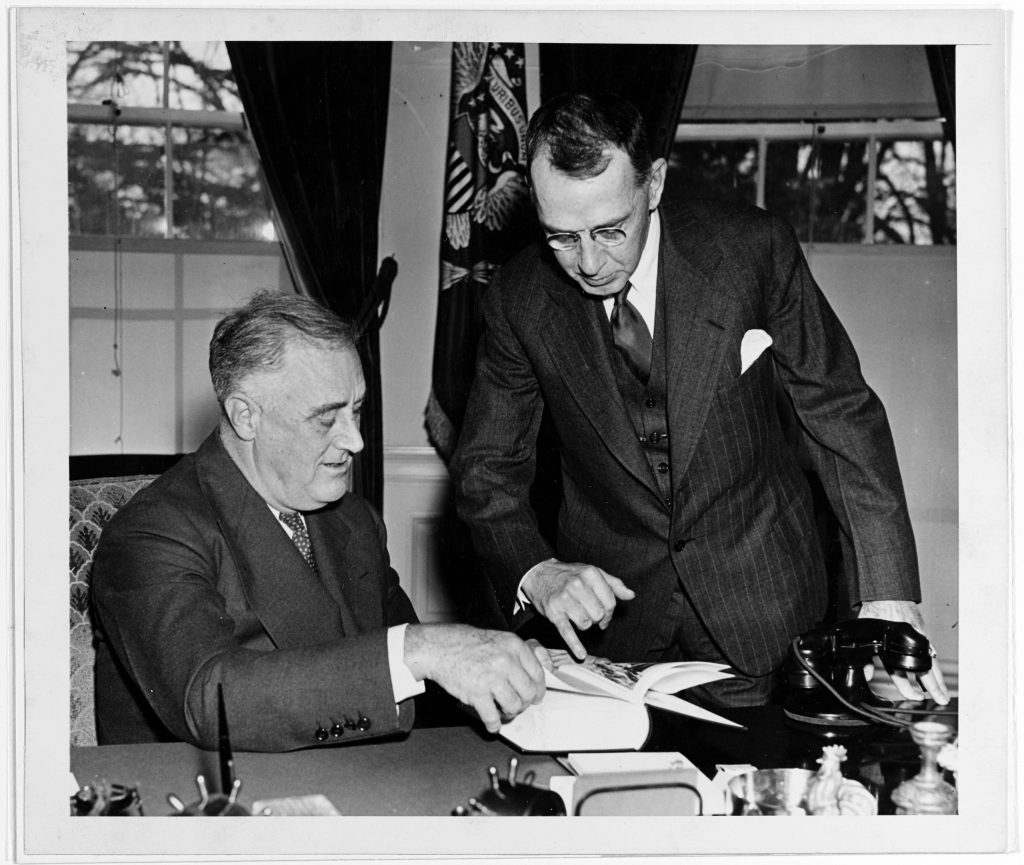 Retired Captain Dudley W. Knox presents President Franklin D. Roosevelt with the final volume of an edited collection official naval records relating to U.S. Navy strategy and operations during the undeclared War with France between 1798 and 1801. After four years work, Roosevelt and Knox worked together to complete these volumes by 1938. Roosevelt insisted upon referring to the "Quasi-War" with France, much to the chagrin of Knox. However, Roosevelt specifically chose this phrase for the title of the work, as the underlying point of the work centered upon how he intended to employ the U.S. Navy in support of American neutrality strategy before the Second World War. Together, Roosevelt and Knox used history to inform American naval strategy in both peace and war.