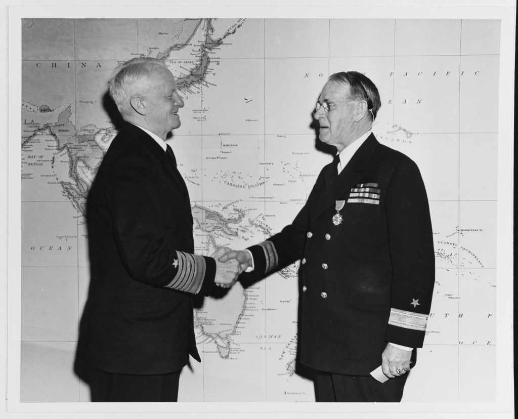  Fleet Admiral Chester W. Nimitz congratulating Commodore Dudley W. Knox with a Legion of Merit in 1946. During the Second World War, Knox returned to active status with assignment to the staff of the Chief of Naval Operations and Commander in Chief, U.S. Navy (CominCh). In this capacity, Knox served at large as a strategic adviser to President Franklin D. Roosevelt and Fleet Admiral Ernest J. King. Through their good offices, Knox established the Office of Naval History as a coequal branch of the Office of Naval Intelligence on the Operations Navy (OpNav) staff. For this service, King nominated Knox for promotion to commodore in 1945. The following year, the postwar Chief of Naval Operations, Nimitz, recognized Knox with the Legion of Merit Medal to mark his return to retired status. Nevertheless, Knox continued working within the Office of Naval History until his death in 1960.