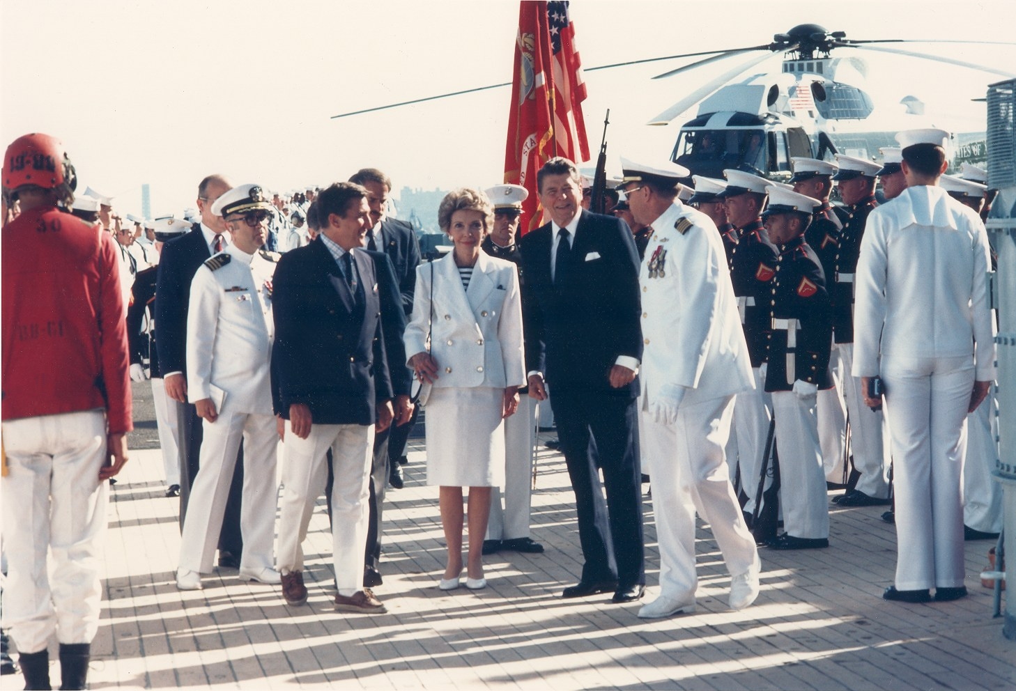 Navy Secretary John Lehman greeting President and Mrs. Reagan aboard the battleship Iowa for 100th anniversary celebration of the Statue of Liberty on July 4, 1986 in New York Harbor.