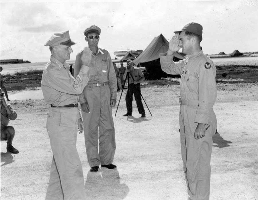 General Carl Spaatz decorates Tibbets with the Distinguished Service Cross after the Hiroshima mission/USAF Official Photo