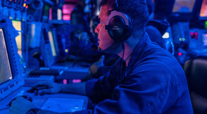A U.S. Sailor stands watch in the combat information center aboard Arleigh Burke-class guided-missile destroyer USS Donald Cook (DDG 75), June 8, 2026. Donald Cook is deployed to the U.S. 5th Fleet area of operations to support maritime security and stability in the Middle East. (U.S. Navy Photo)