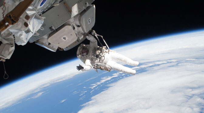 NASA astronaut Nicholas Patrick, STS-130 mission specialist, doing extravehicular activity (EVA) on the International Space Station.