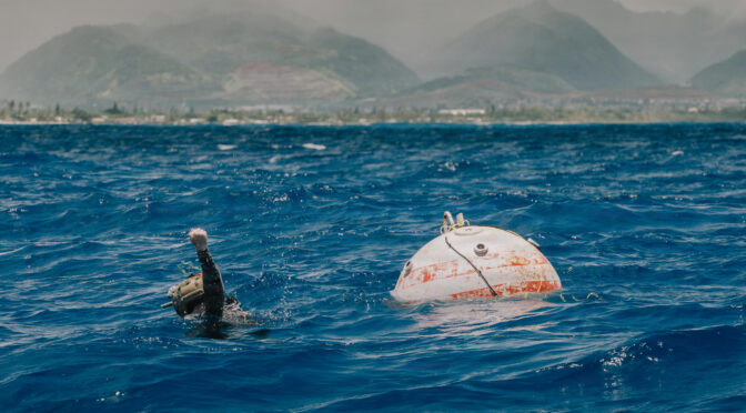 A U.S. Navy explosive ordnance disposal technician assigned to Explosive Ordnance Disposal Mobile Unit 11 conducts mine countermeasures training during Exercise Rim of the Pacific 2026 off the coast of Oahu, Hawaii, July 2, 2026.